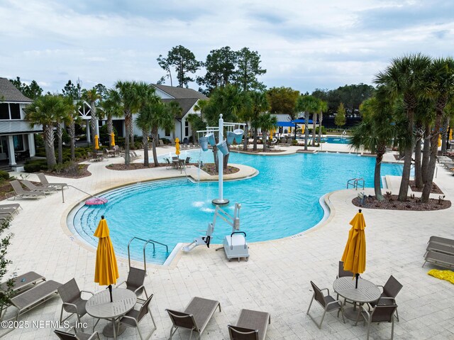 community pool with a patio