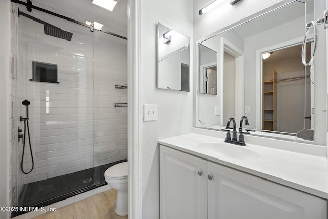 100 Fairway Park Blvd Unit 1809, Ponte Vedra Beach, FL 32082 - full bath with toilet, a shower stall, vanity, and wood finished floors