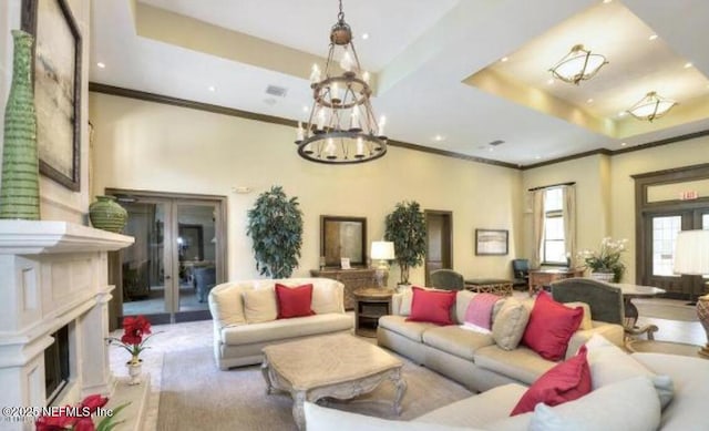 100 Fairway Park Blvd Unit 1809, Ponte Vedra Beach, FL 32082 - living area featuring a raised ceiling, ornamental molding, a fireplace, a chandelier, and recessed lighting