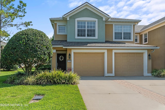 6750 White Blossom Cir Unit 36A, Jacksonville, FL 32258 - traditional-style house with driveway, stucco siding, an attached garage, and a front yard