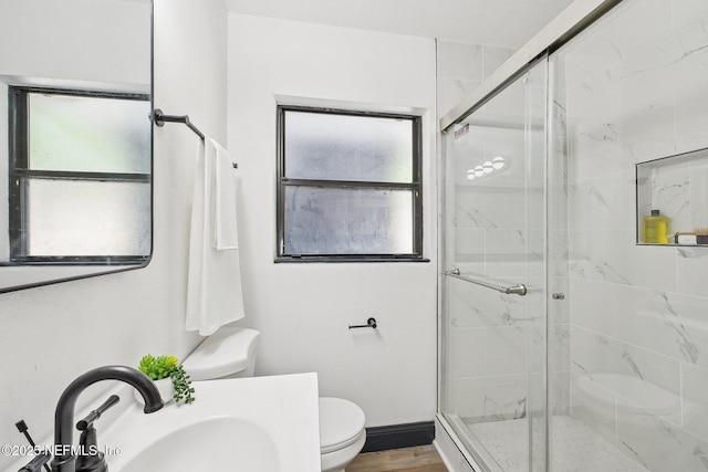 5444 Keystone Dr S, Jacksonville, FL 32207 - full bathroom with a sink, toilet, and a stall shower