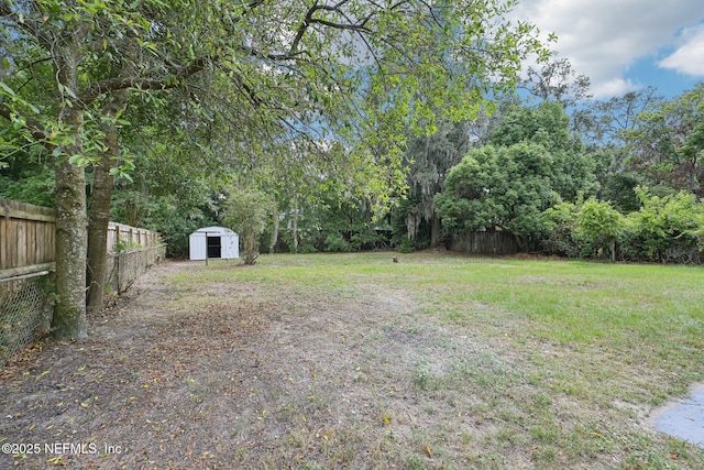 5444 Keystone Dr S, Jacksonville, FL 32207 - view of yard with a storage shed and an outdoor structure