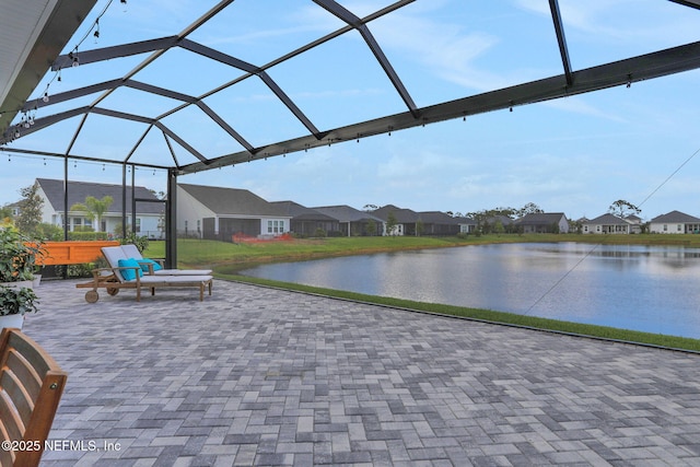 181 Lamego Ln, Saint Augustine, FL 32095 - view of patio / terrace featuring a residential view, a water view, and a lanai