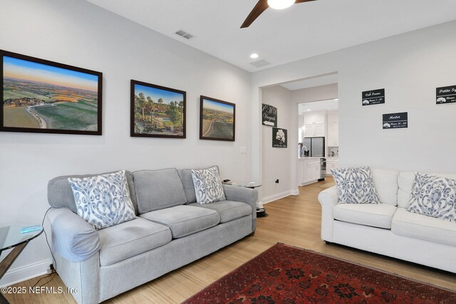 181 Lamego Ln, Saint Augustine, FL 32095 - living room with a ceiling fan, baseboards, light wood-style flooring, and recessed lighting