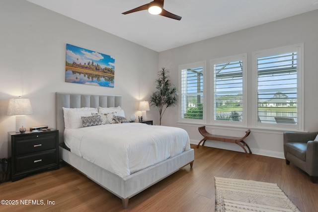 181 Lamego Ln, Saint Augustine, FL 32095 - bedroom with baseboards, wood finished floors, and a ceiling fan