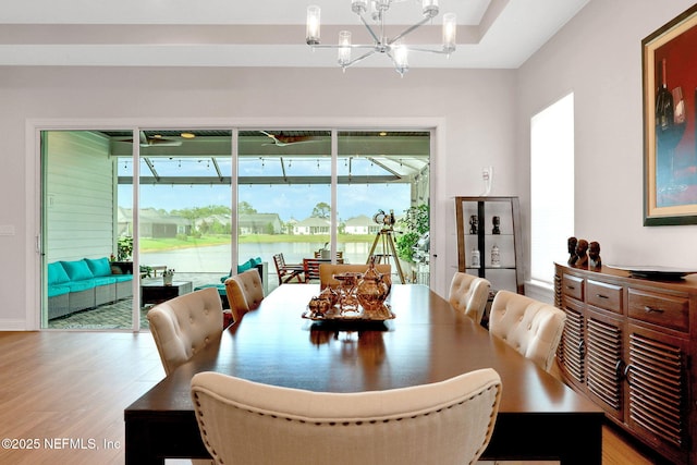 181 Lamego Ln, Saint Augustine, FL 32095 - dining area featuring a chandelier and wood finished floors
