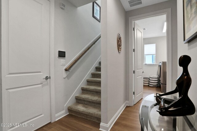 181 Lamego Ln, Saint Augustine, FL 32095 - stairs with wood finished floors and baseboards
