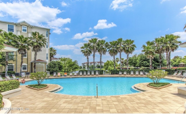 7801 Point Meadows Dr Unit 1108, Jacksonville, FL 32256 - community pool with a patio and fence