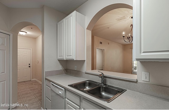 7801 Point Meadows Dr Unit 1108, Jacksonville, FL 32256 - kitchen with white cabinetry, visible vents, arched walkways, dishwasher, and light tile patterned flooring