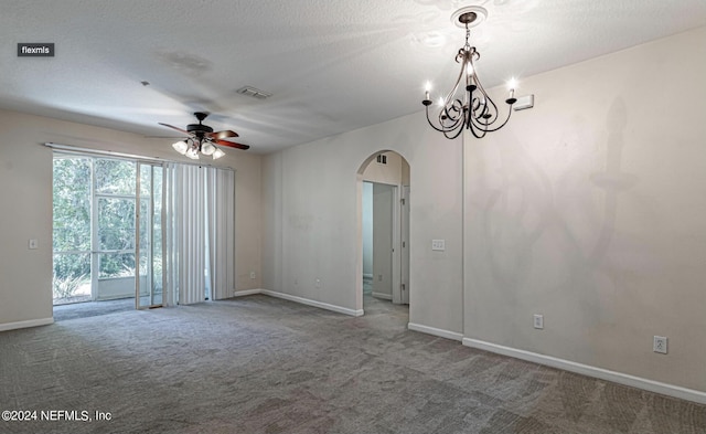 7801 Point Meadows Dr Unit 1108, Jacksonville, FL 32256 - unfurnished room with carpet flooring, baseboards, ceiling fan with notable chandelier, and arched walkways