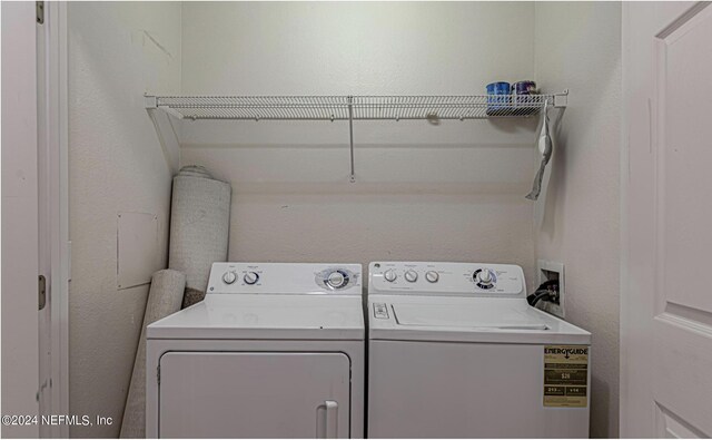 7801 Point Meadows Dr Unit 1108, Jacksonville, FL 32256 - laundry room with laundry area and washer and dryer