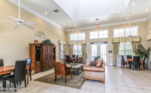 7801 Point Meadows Dr Unit 1108, Jacksonville, FL 32256 - living room with a healthy amount of sunlight, light tile patterned flooring, a high ceiling, and visible vents