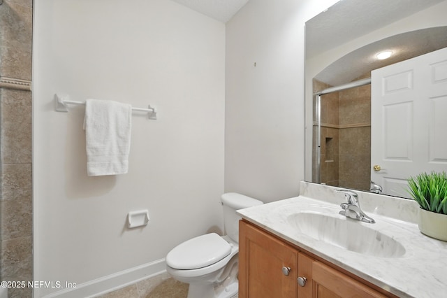 5279 Cattle Crossing Way, Jacksonville, FL 32226 - full bath featuring toilet, vanity, tile patterned flooring, baseboards, and tiled shower