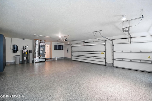 5279 Cattle Crossing Way, Jacksonville, FL 32226 - garage with water heater, heating unit, baseboards, and a garage door opener
