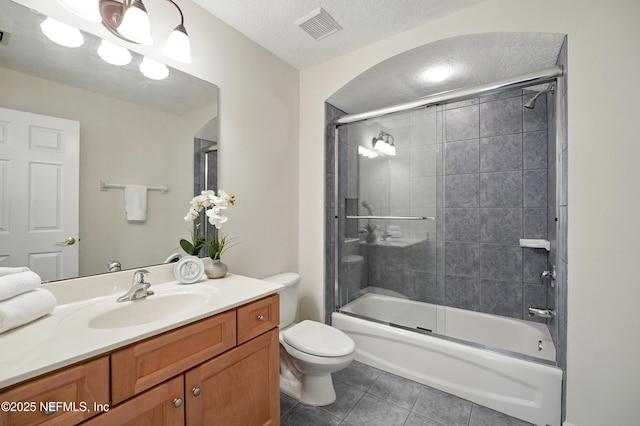 5279 Cattle Crossing Way, Jacksonville, FL 32226 - bathroom with a textured ceiling, toilet, visible vents, tile patterned flooring, and vanity