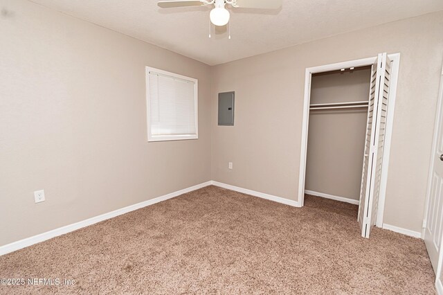 610 S 9th St, Macclenny, FL 32063 - unfurnished bedroom featuring carpet flooring, a closet, electric panel, and baseboards
