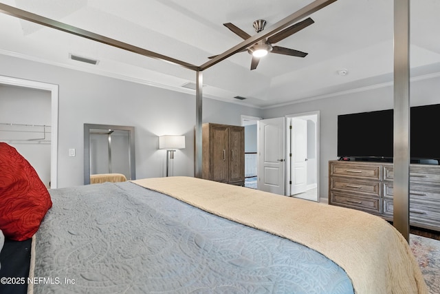 bedroom featuring ornamental molding and ceiling fan
