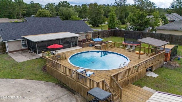 4384 Hickory St, Macclenny, FL 32063 - view of pool featuring a sunroom and a wooden deck
