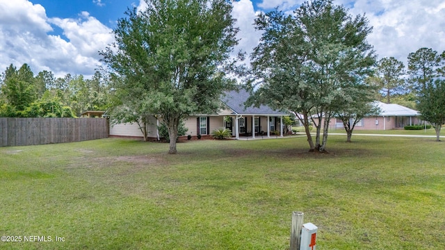 4384 Hickory St, Macclenny, FL 32063 - view of yard featuring a porch