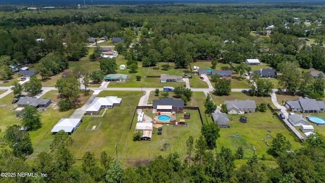 4384 Hickory St, Macclenny, FL 32063 - aerial view of property and surrounding area featuring a heavily wooded area and a pool