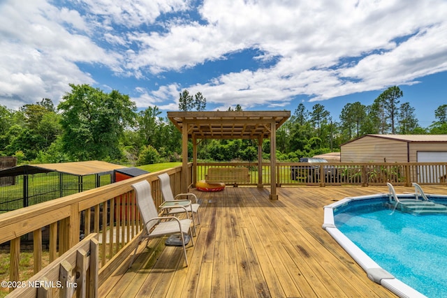 4384 Hickory St, Macclenny, FL 32063 - view of pool with a wooden deck and view of scattered trees