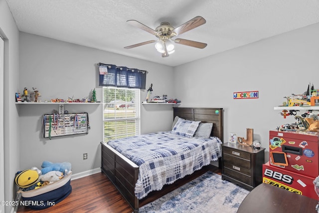 4384 Hickory St, Macclenny, FL 32063 - bedroom with wood finished floors, baseboards, a textured ceiling, and ceiling fan