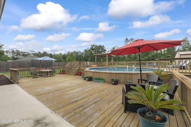 4384 Hickory St, Macclenny, FL 32063 - wooden deck featuring outdoor dining space and fence