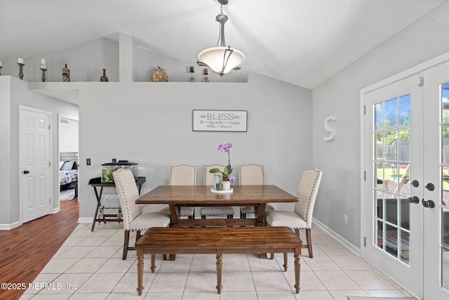 4384 Hickory St, Macclenny, FL 32063 - dining room featuring lofted ceiling, french doors, baseboards, and light tile patterned floors