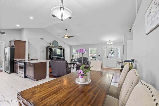 4384 Hickory St, Macclenny, FL 32063 - dining area featuring ceiling fan, lofted ceiling, light tile patterned floors, a chandelier, and recessed lighting