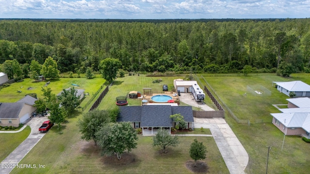 4384 Hickory St, Macclenny, FL 32063 - aerial view of property and surrounding area with a heavily wooded area