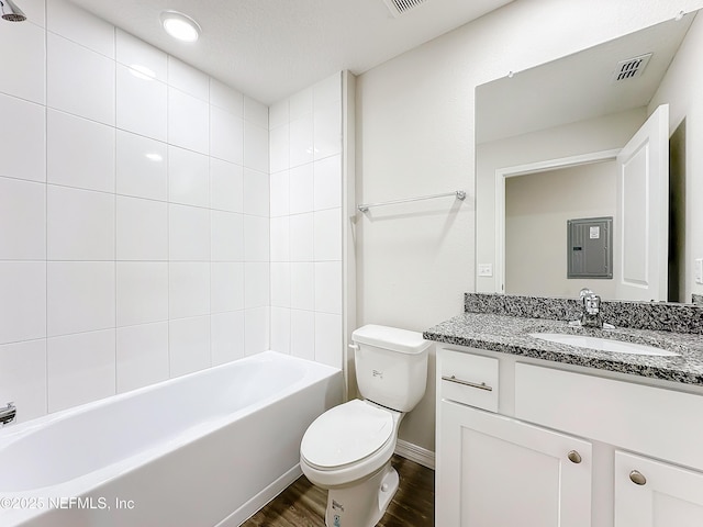 11462 Oakfield Ct, Jacksonville, FL 32258 - full bath featuring toilet, wood finished floors, vanity, visible vents, and baseboards