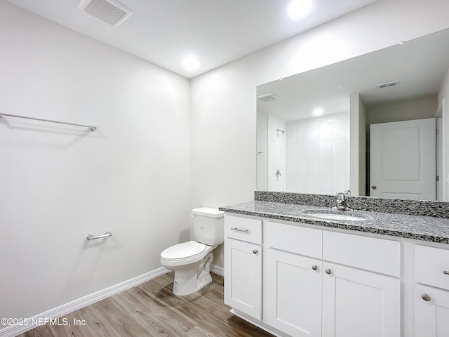 11462 Oakfield Ct, Jacksonville, FL 32258 - full bath featuring baseboards, toilet, visible vents, and wood finished floors