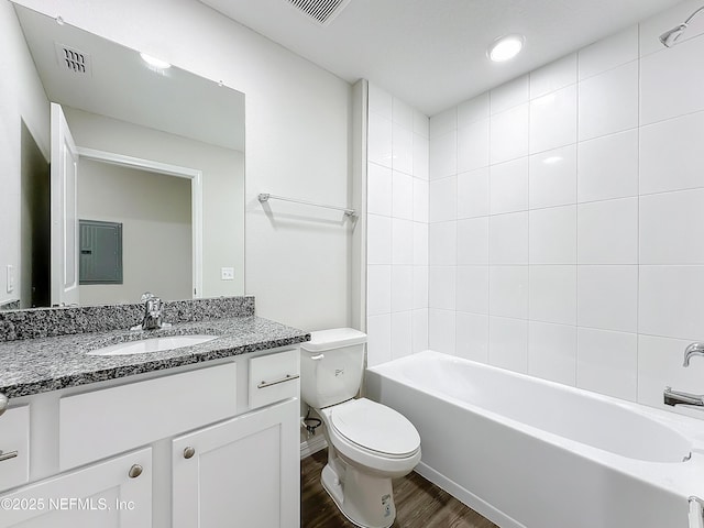 11462 Oakfield Ct, Jacksonville, FL 32258 - full bath featuring shower / bath combination, toilet, visible vents, vanity, and wood finished floors