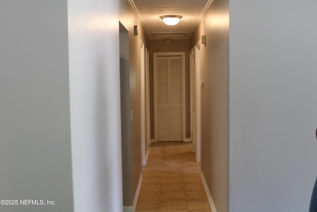 10306 Jolynn Rd, Jacksonville, FL 32225 - corridor featuring baseboards and light tile patterned floors