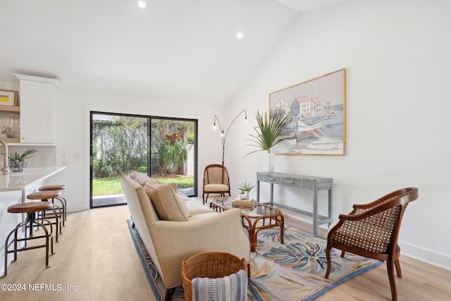2537 Dauphine Ct E, Ponte Vedra Beach, FL 32082 - living room featuring vaulted ceiling, light wood-type flooring, and recessed lighting