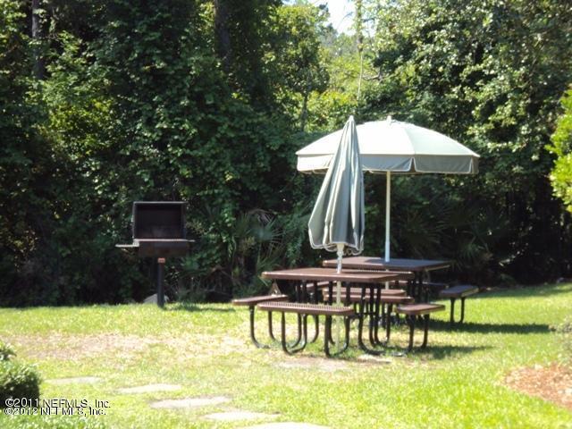7701 Timberlin Park Blvd Unit 623, Jacksonville, FL 32256 - view of grassy yard