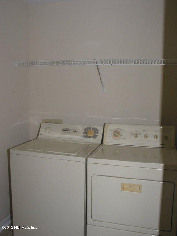 7701 Timberlin Park Blvd Unit 623, Jacksonville, FL 32256 - laundry room with separate washer and dryer