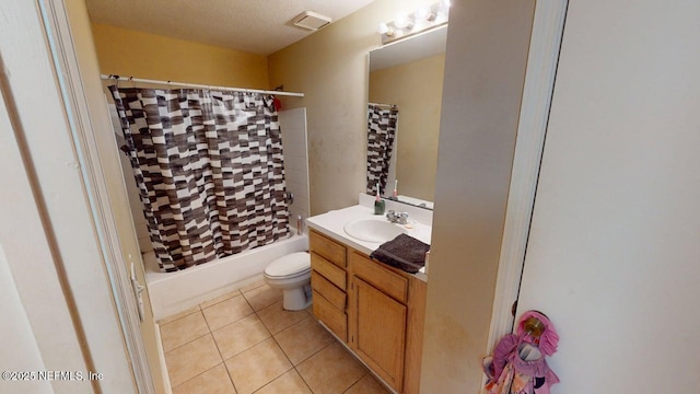 7701 Timberlin Park Blvd Unit 623, Jacksonville, FL 32256 - bathroom with vanity, shower / bath combo with shower curtain, toilet, and tile patterned flooring
