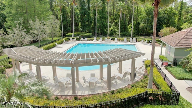 7701 Timberlin Park Blvd Unit 623, Jacksonville, FL 32256 - community pool featuring a patio