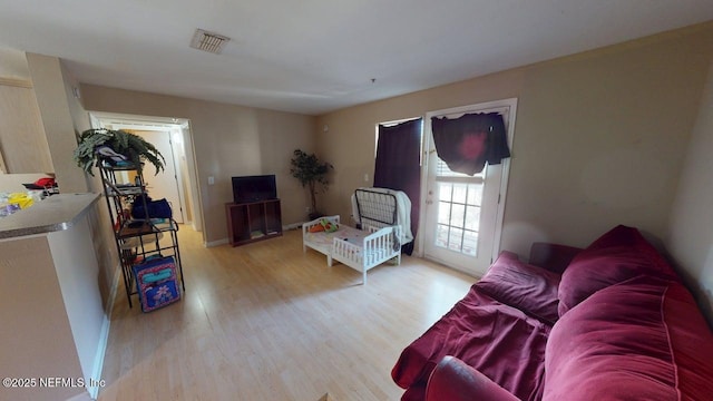 7701 Timberlin Park Blvd Unit 623, Jacksonville, FL 32256 - living area featuring light wood-type flooring