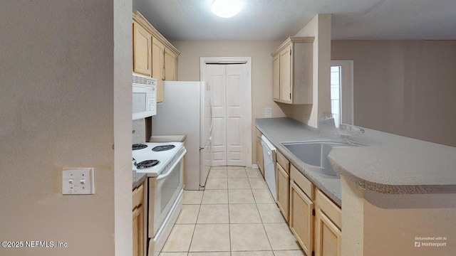 7701 Timberlin Park Blvd Unit 623, Jacksonville, FL 32256 - kitchen featuring white appliances, a sink, a peninsula, light brown cabinetry, and light tile patterned floors
