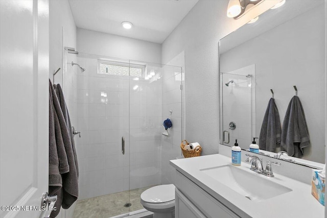 169 Rivercliff Trl, Saint Augustine, FL 32092 - bathroom with vanity, a stall shower, and toilet