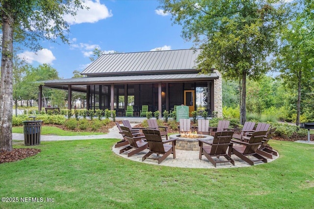 169 Rivercliff Trl, Saint Augustine, FL 32092 - view of patio featuring an outdoor fire pit