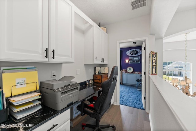 11698 Donato Dr, Jacksonville, FL 32226 - office area with wood finished floors and a chandelier