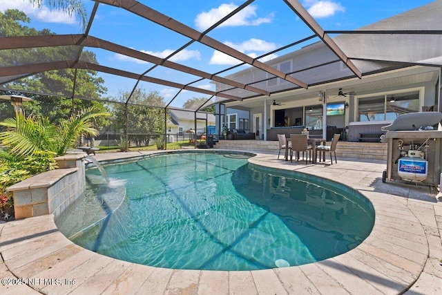 11698 Donato Dr, Jacksonville, FL 32226 - swimming pool with a patio area, a ceiling fan, a lanai, and outdoor dining space