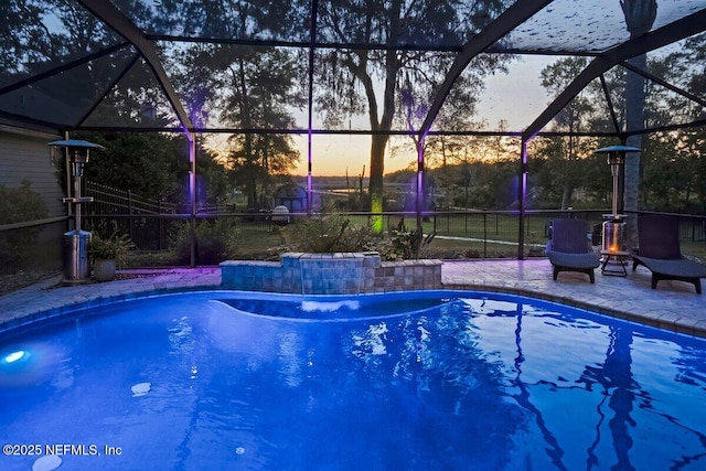 11698 Donato Dr, Jacksonville, FL 32226 - swimming pool with glass enclosure and a patio