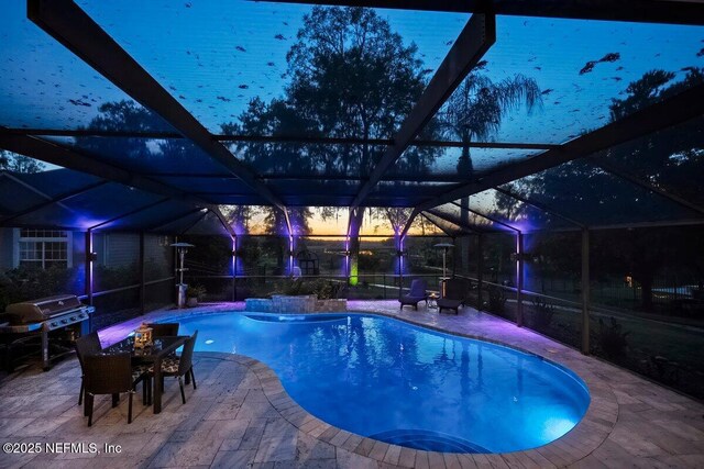 11698 Donato Dr, Jacksonville, FL 32226 - swimming pool with a grill, a lanai, and a patio