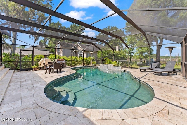 11698 Donato Dr, Jacksonville, FL 32226 - outdoor pool with a patio area, a lanai, and grilling area