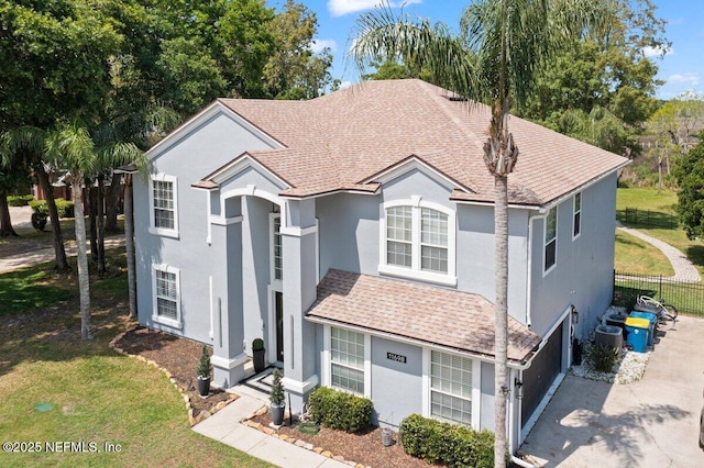 11698 Donato Dr, Jacksonville, FL 32226 - view of front of property with stucco siding and central air condition unit