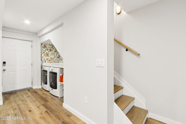 2902 W 5th St, Fernandina Beach, FL 32034 - entrance foyer with independent washer and dryer, light wood-type flooring, stairway, baseboards, and recessed lighting